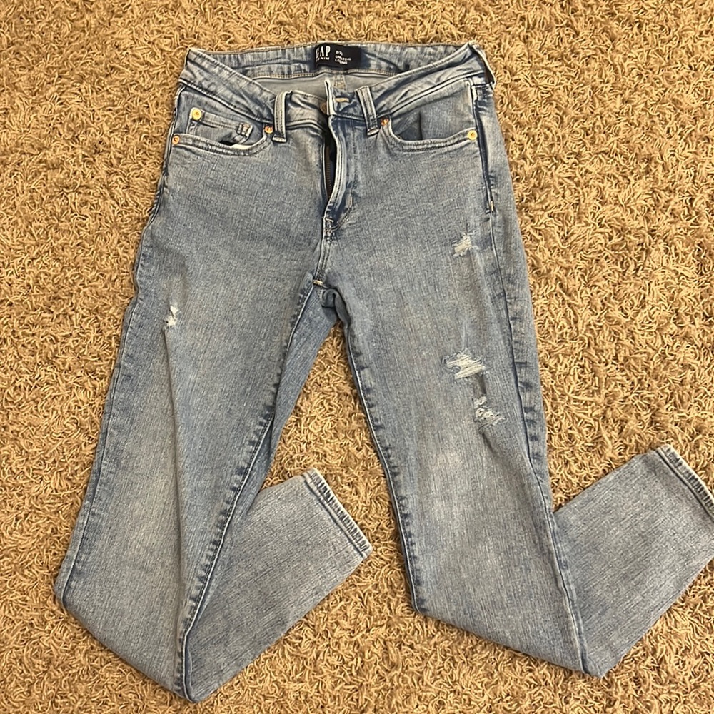 light wash, low rise, few holes